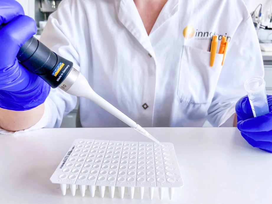 Pipetting into a FluoGene plate